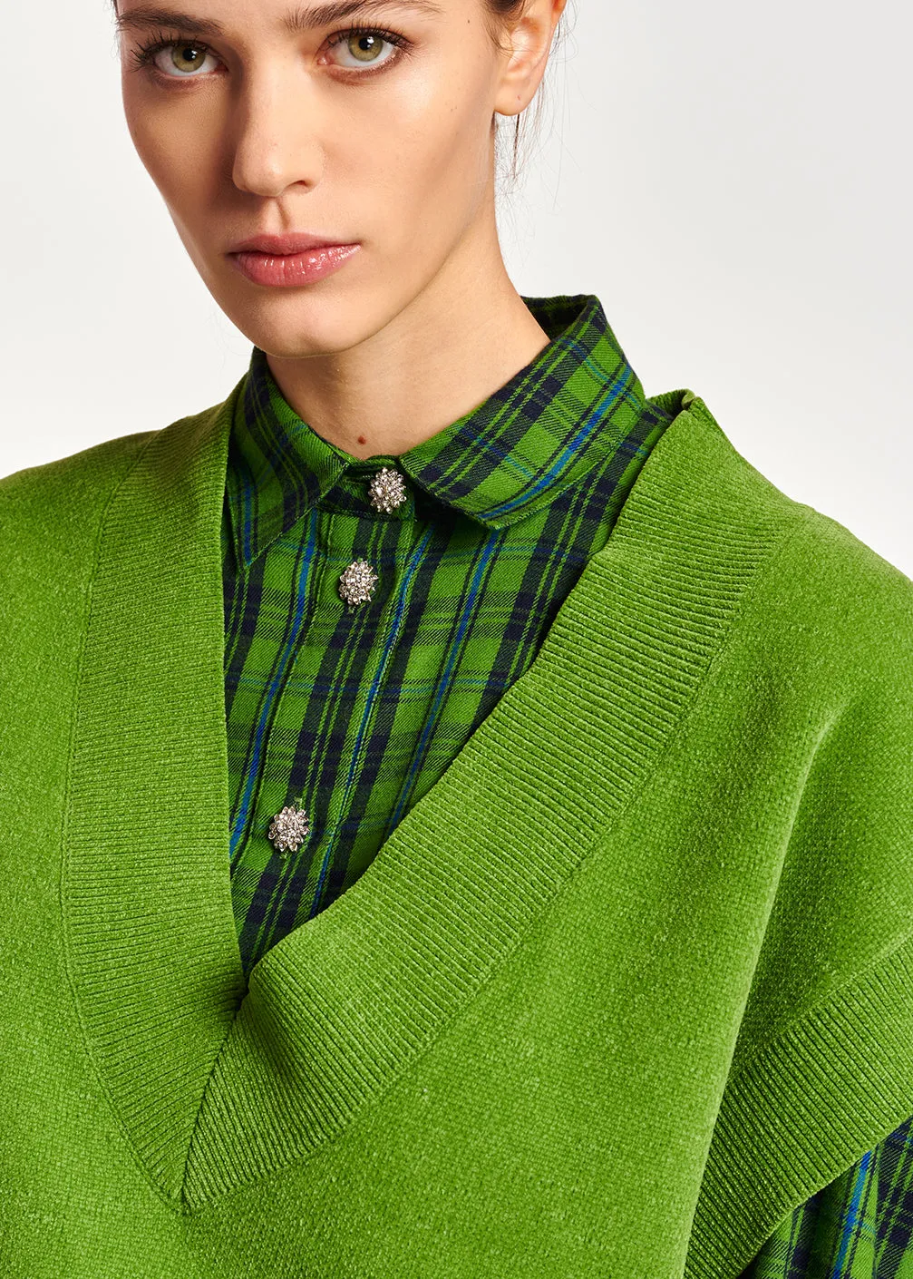 Green sleeveless knitted vest